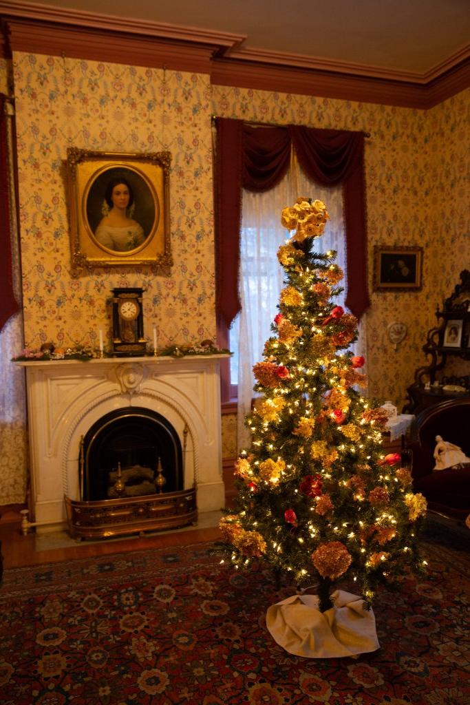 Seward House Museum room decorated for the holiday with a Christmas tree